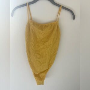 Detailing open back yellow body suit